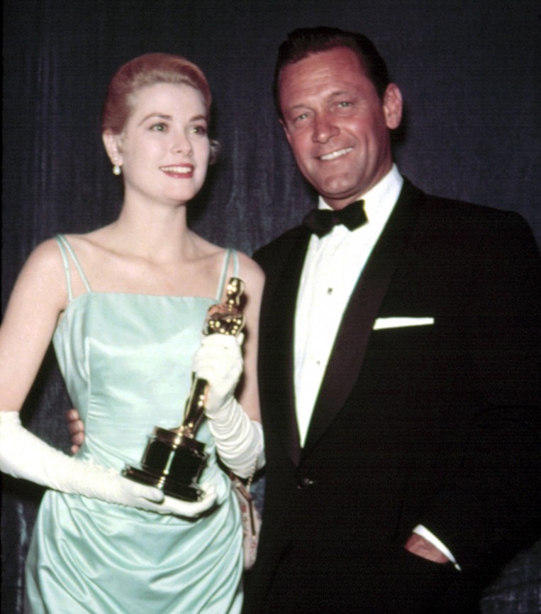 No Merchandising. Editorial Use Only. No Book Cover Usage Mandatory Credit: Photo by Everett/REX/Shutterstock (409658t) GRACE KELLY, The Country Girl, accepting Oscar from WILLIAM HOLDEN, Oscars - 1955 VARIOUS